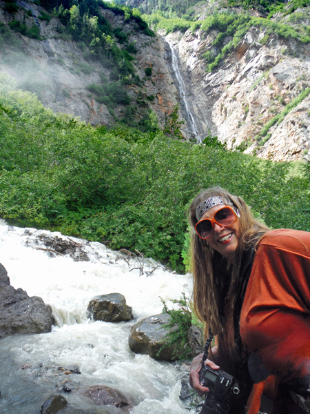 Karen Duquette in front of the waterfall